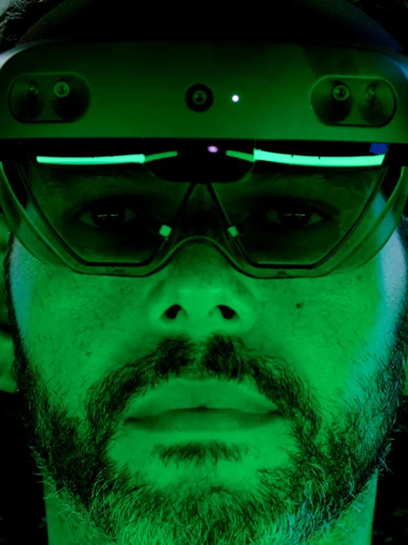 Manufacturer with green lense